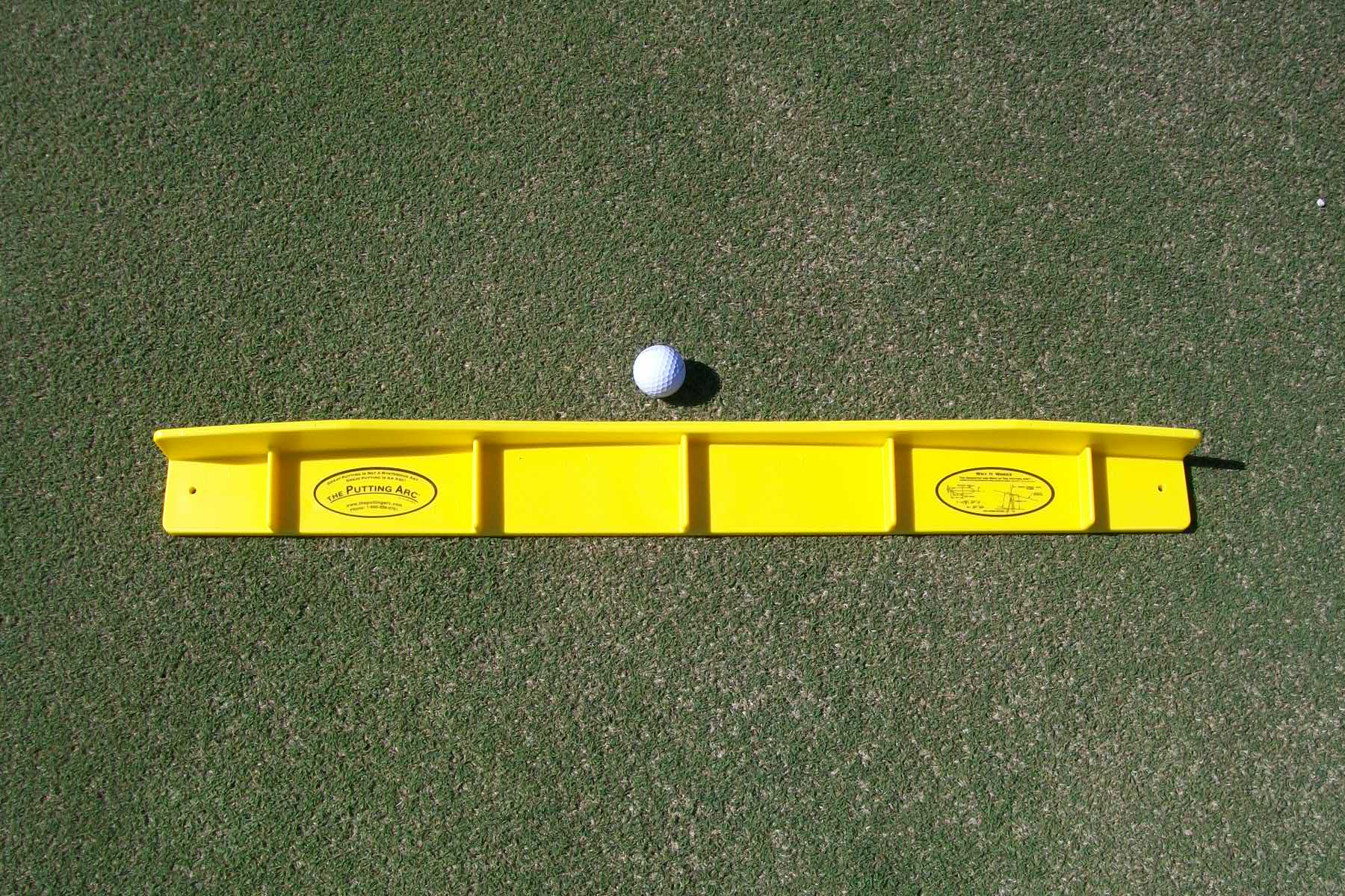 Putting Arc MSIII training aid on a putting green overhead view showing alignment guides